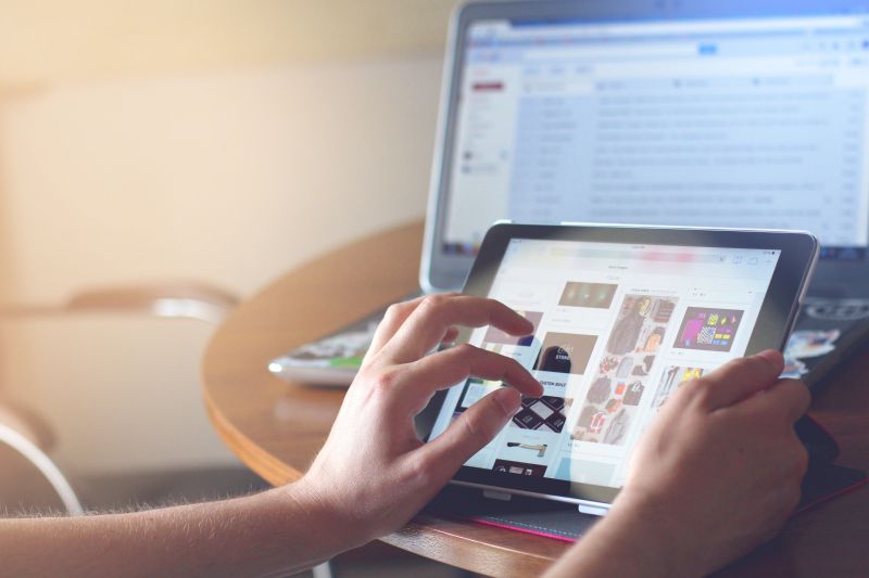 algorithim update displays local website on woman's ipad