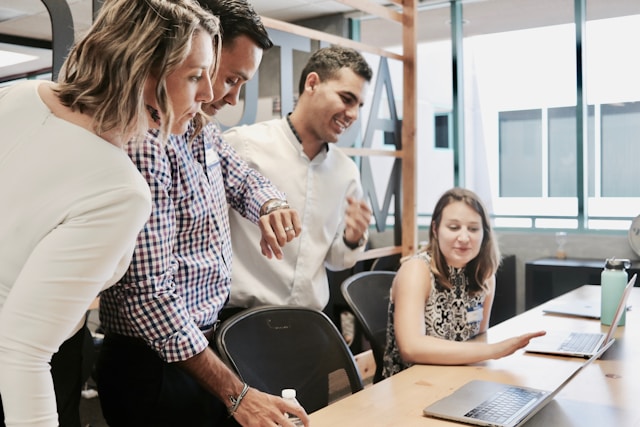 Marketing team collaborating with AI